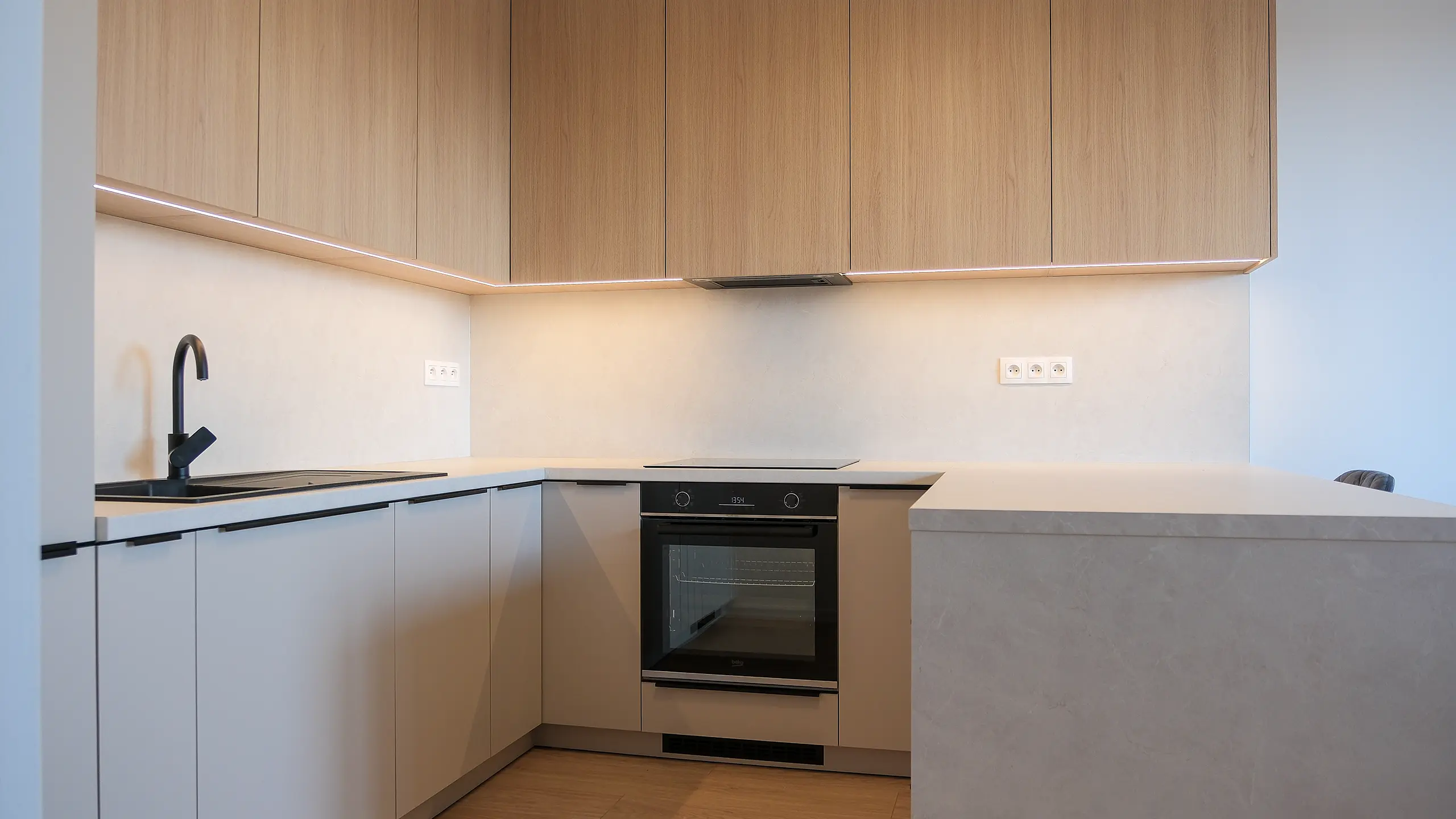 Residential Project Laurin dvor – modern kitchen with an island and minimalist design - obrázok 17